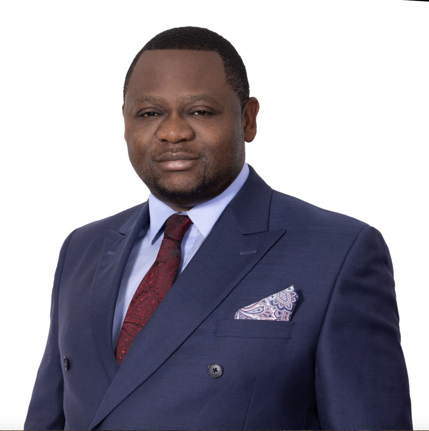 Professional headshot of a man in a navy suit by Patrycja Hyrsz